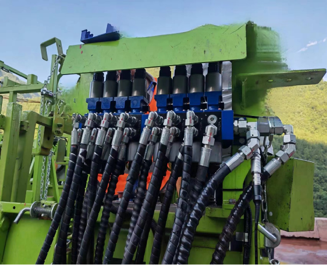 Modular directional control valve bank for tunnel arch-anchor machine